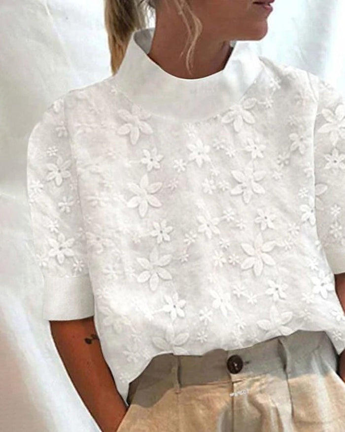 Lilava – Elegancki top z haftem i stójką